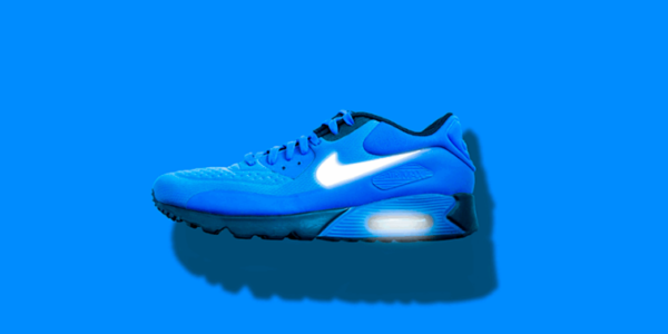 A Blue Nike Shoe with the Nike Logo